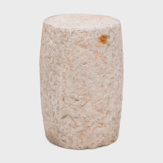 This low drum stool from Shanxi province was hand-carved from solid limestone over 150 years ago, designed to add the...