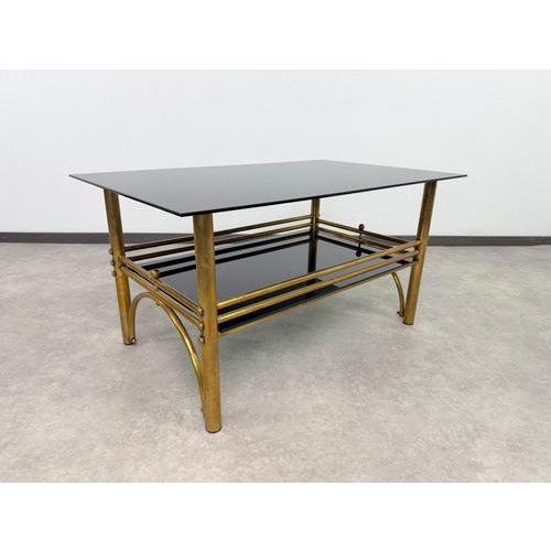 Hollywood Regency Hollywood Regency Postmodern Brass and Black Glass 2-Tier Coffee Table, 1960s For Sale - Image 3 of 10