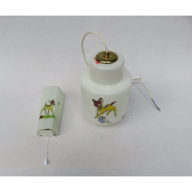 This set is comprised of one ceiling light and one wall light. They were produced by Doria Leuchten in the 1950s. The...