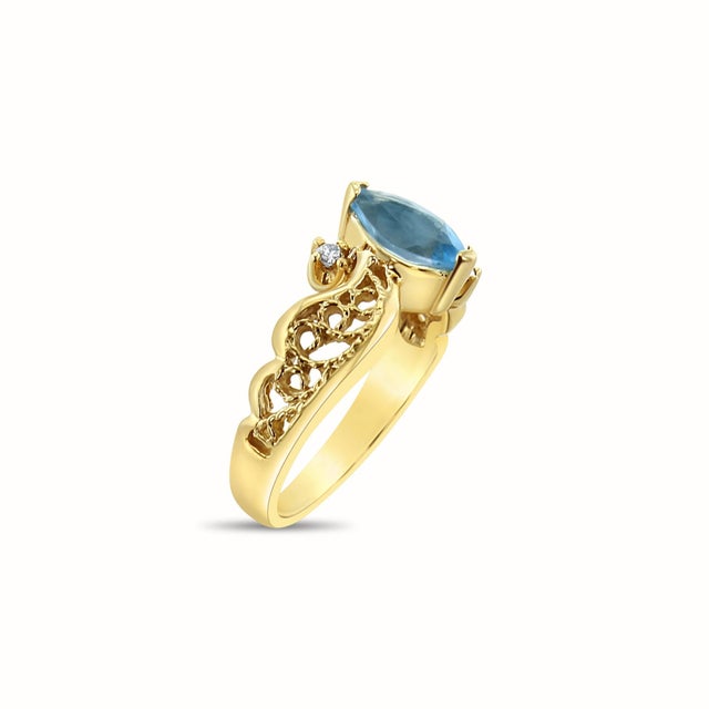 Contemporary Marquise Blue Topaz Ring with Diamond Accents 14k Yellow Gold, Size 9 For Sale - Image 3 of 6