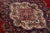 Beautiful vintage Persian Tabriz hand-knotted wool rug with a red color field. This piece has a navy blue frame and...