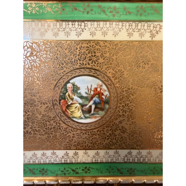 Beautifully decorative French-style La-Mieux porcelain tray featuring an exquisite romantic courting scene at the center,...
