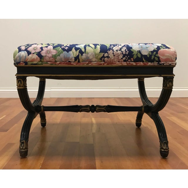 Classic beauty and style in the X form bench. Original painted finish of Black and gold over a carved wood frame without...