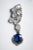 A lovely pair of clustered cabochon rainbow moonstones with a large, faceted oval kyantie gemstones dangling from the...