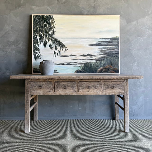 This charming vintage elm wood console is a one-of-a-kind piece with beautiful age and patina that adds character to any...