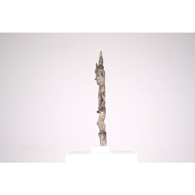 Ancestral Hampatong Dayak figure in ironwood (ulin), Borneo, 19th century or earlier. Old patina, wear and tear....