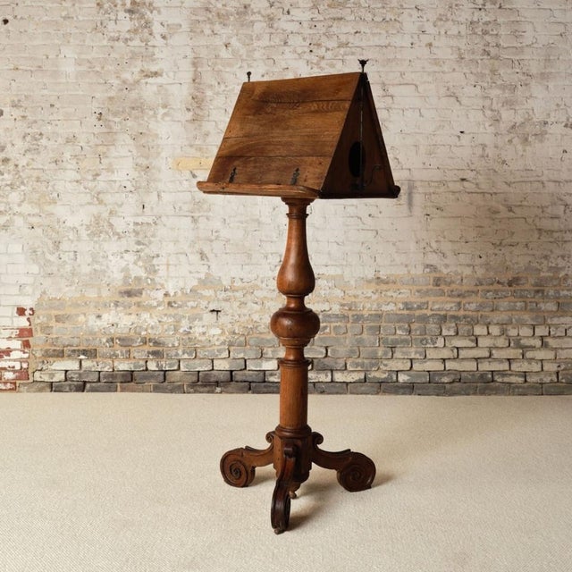 Add a rare and meaningful piece of history to your collection with this 18th century French oak Bible stand, a beautifully...