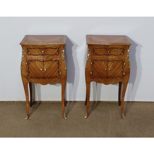 Beautiful pair of small furniture in marquetry of wood of and of, curved on the facade and on the sides, recalling the...