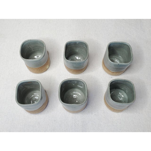 This is a set of beautiful Asian style tea cups. They are each individual in the wabi sabi style, and hand made, but...