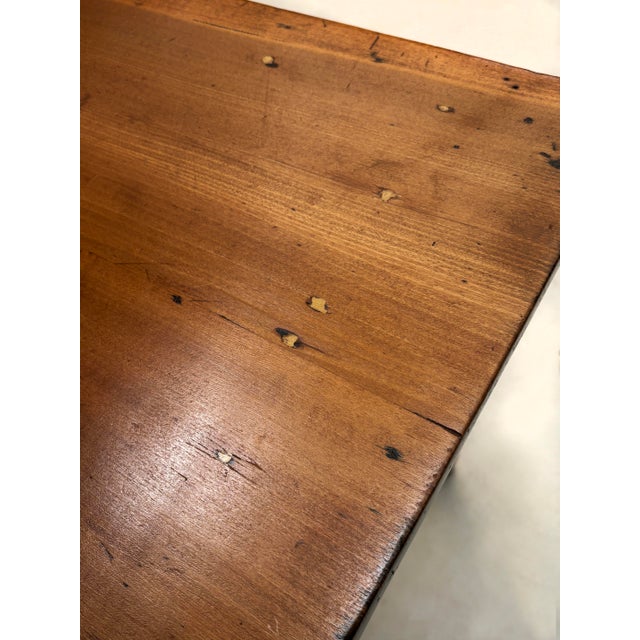 An authentic early American Country two-piece plantation desk or plantation secretary, handcrafted in solid pine during...