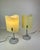 Beautiful set of two table lamps made of two wavy yellow-butter opaline glass lampshades on a grey sandblasted-metal base...