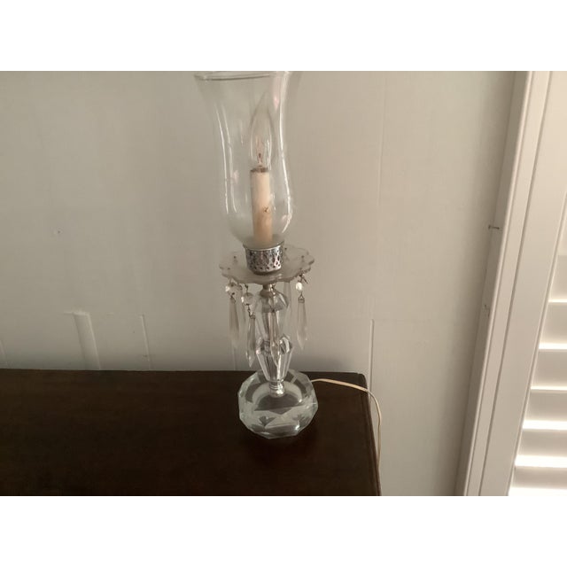 Lamps with hurricane design and shade with hanging faux crystal prisms. Early 21st century