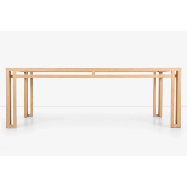 Pickled oak frame with 3/4" glass top. Glass top acsentuates the base by revealing the true craftsmanship and construction...