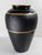 We are selling this gorgeous early 20th century Czech art glass vase. This vase has dark amber or amethyst colored glass...