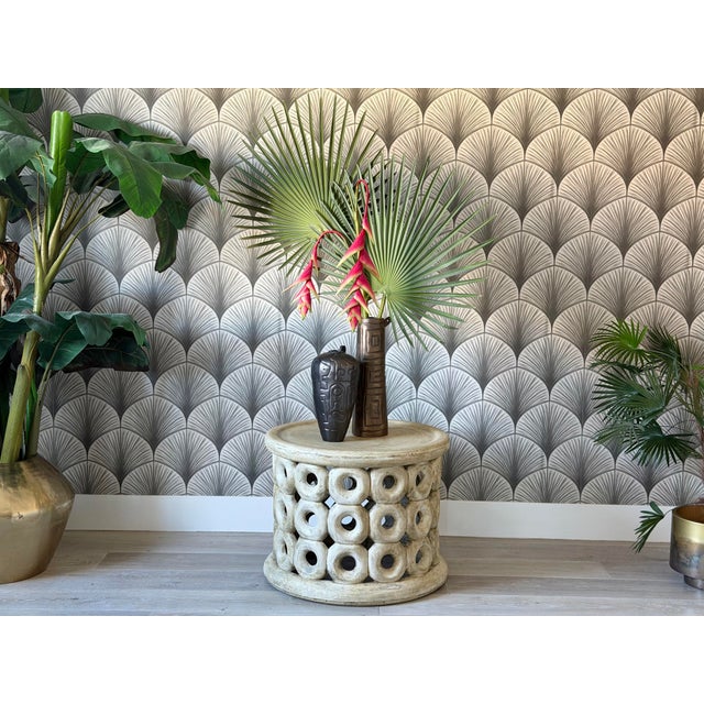 Antiqued Transitional Tribal Drum-Style Concrete “Davenport” Coffee Table by Made Goods Dimensions: 20" TALL 25 3/8"...