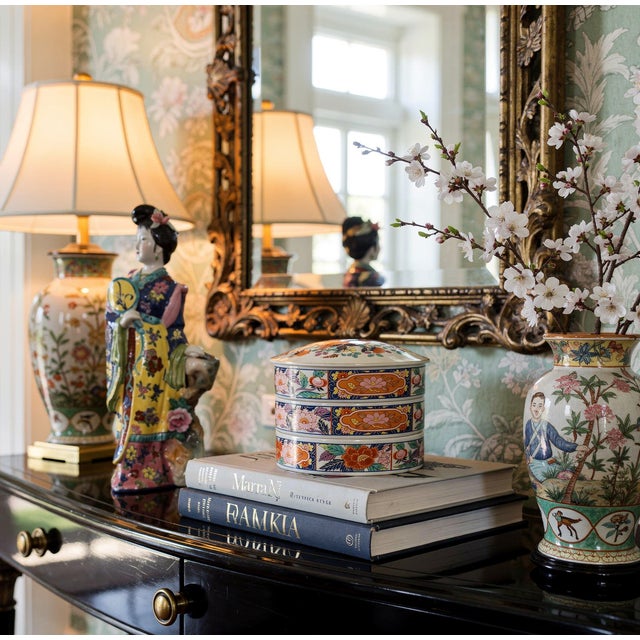 Capture the sculptural elegance of mid-century design with this striking vintage oriental figurative lamp base or...
