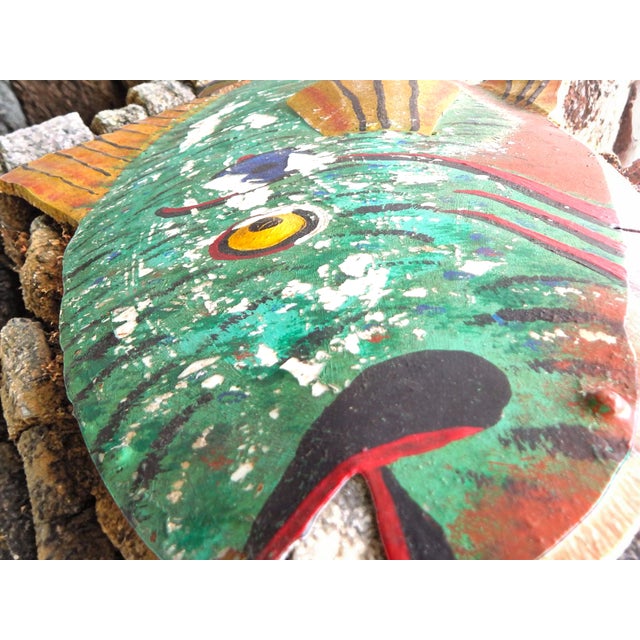 Hand cut, fashioned, and painted fish formerly hung outside a bait shop in Michigan's upper peninsula. Great peel-y paint....