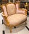 Create an atmosphere of timeless romance with this exquisite French Louis XV Loveseat Sofa, a luxurious statement piece...