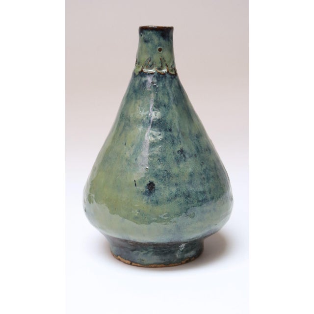 Primitive-style glazed vase signed D. McKay (ca. 1970s). Crude by design -- vessel and pattern are asymmetrical with an...