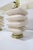 Beautiful travertine lamps in a stacked silhouette. lamps are newly wired with brass base and brass fittings. We paired...