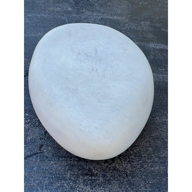 The finish on the River Stone Coffee Table has stone flakes that have been applied to the surface. . The surface can...