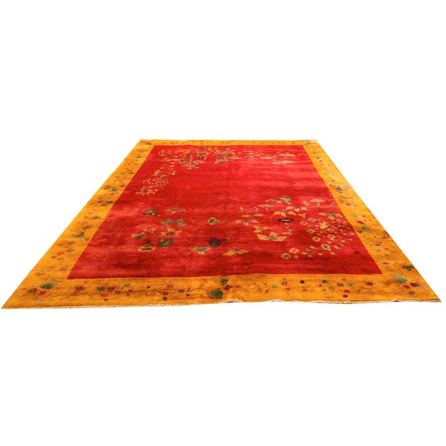 This circa 1920s Chinese Art Deco rug is a hand-knotted wool piece measuring approximately 8' 10" x 11' 2". It is...
