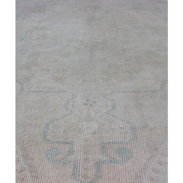Measures: 4'5 x 7'1 Vintage Turkish Oushak Rug in Pale Blue, Taupe and Soft Pastel Tones. Keivan Woven Arts / Rug...
