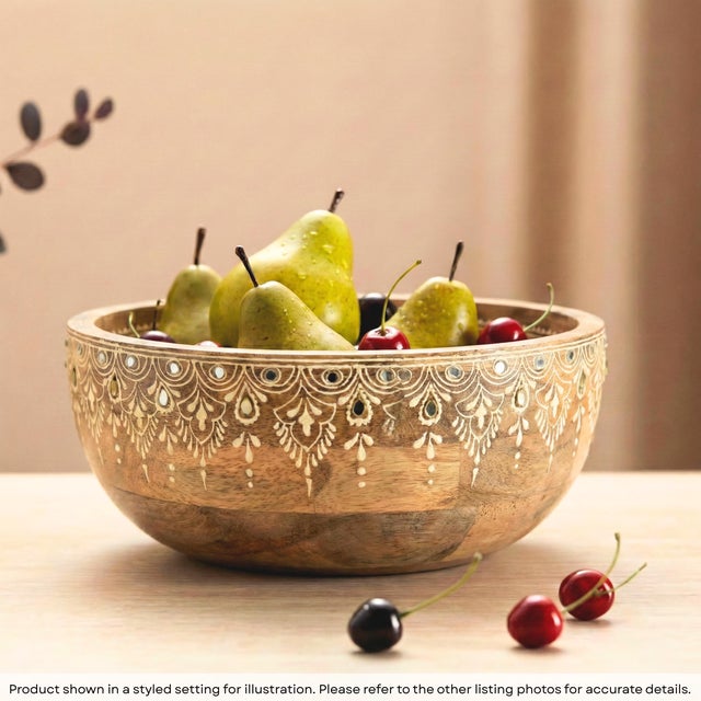 Elevate your kitchen and dining experience with a touch of artisanal soul. This Handcrafted Wood Fruit Bowl is a stunning...