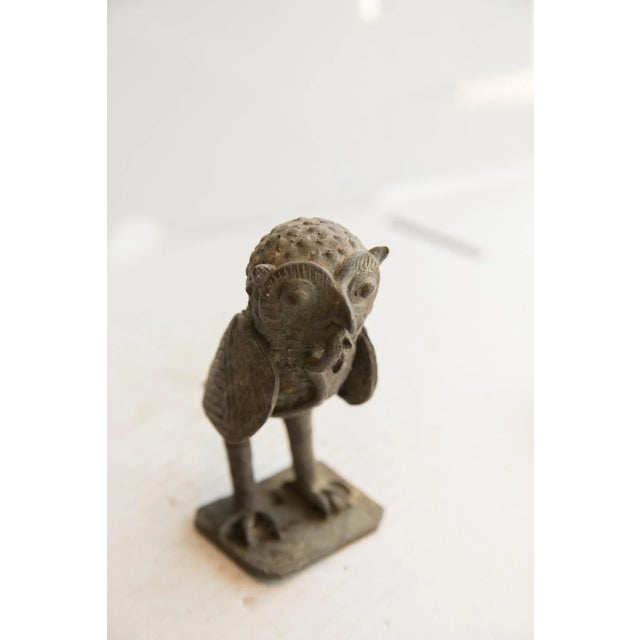 :: Vintage handmade African owl with snake sculpture. Circa late mid 20th century, though possibly older, this piece has...