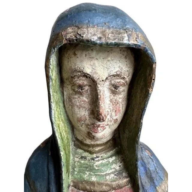 A beautiful antique Santos wood carving of the Virgin Mary — beautiful sculptural lines, a devotional piece with wonderful...