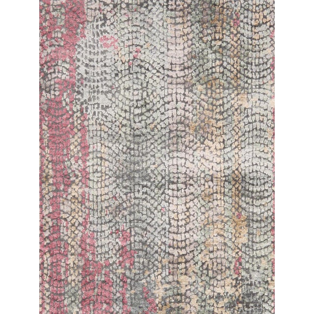 The Gemstone Collection explores hand-knotted designs through abstract patterning, solid tonal fields, and subtle surface...