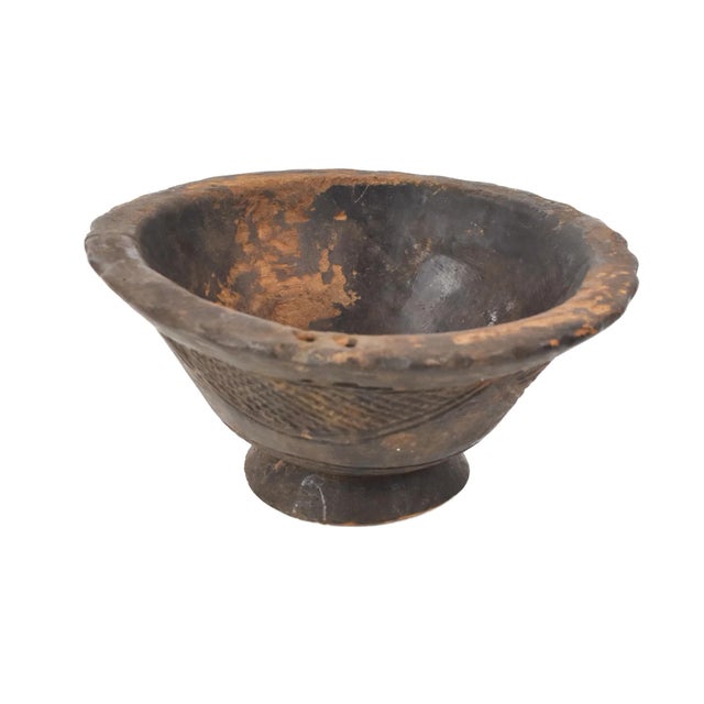 The Tuareg Bowl from Mali is a striking example of the skilled craftsmanship and cultural heritage of the Tuareg people,...