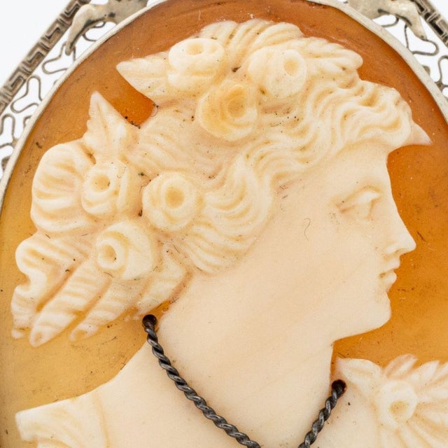 Vintage Carved Shell Cameo 14K Yellow Gold and Diamond Pin Pendant, decorated with one old European cut diamond weighing...