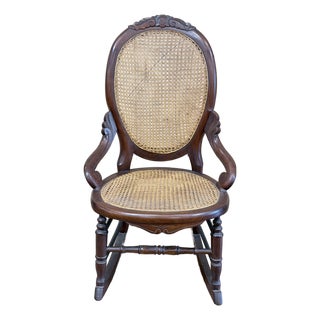 Vintage Victorian Mahogany Cane Back Rocking Chair With Carved Crest For Sale