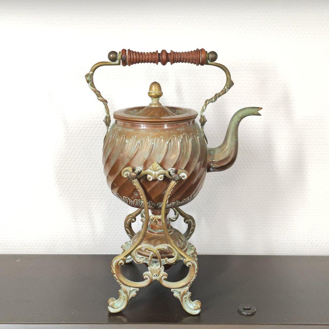 This exquisite antique French tea kettle (spirit kettle) is a testament to the craftsmanship of the Belle Époque era....