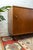 Elevate your space with this authentic, highly collectible mid-century modern credenza designed by designer Milo Baughman...