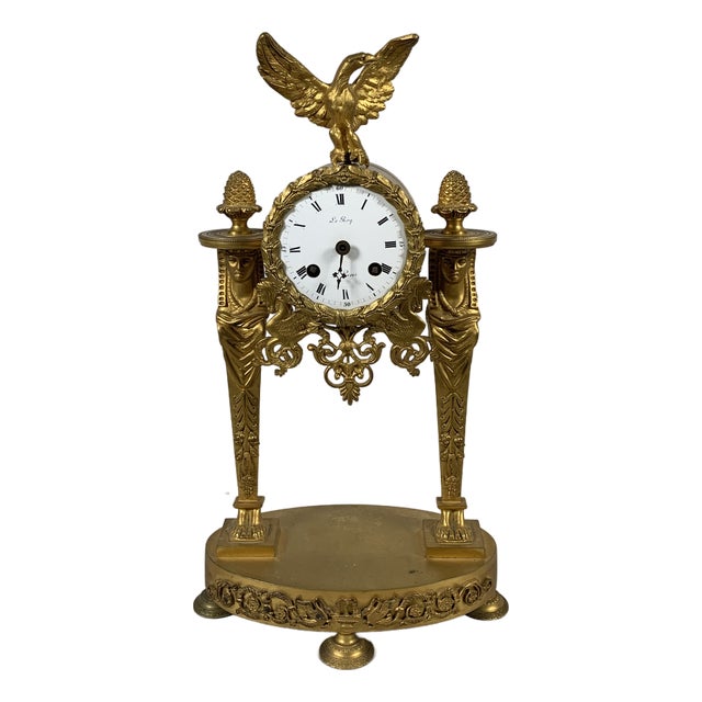 Empire Portico Clock with Egyptian Motifs in Gilt Bronze, 1800 For Sale