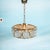 A true eye-catcher, this brass gold-colored hanging lamp with pressed glass circles all around. Height 50 cm. Diameter 37...