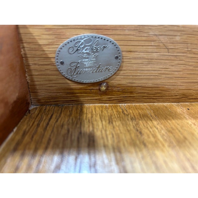 Elevate your bedroom or living area with this Baker Mahogany Chippendale Style Nightstand, a stunning blend of classic...