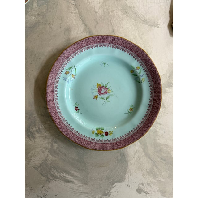 A charming set of three vintage Calyx Ware plates in the Lowestoft pattern by Adams of England, featuring a delicate...