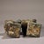 A handsome pair of Chinese bronze figurines depicting mythical water-drawing beasts (吸水兽, "xishui shou"), each crouching...