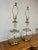 Simple elegance in these glass and brass urn lamps. wonderful presence with understated elegance. Clear glass urn forms...