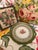 Beautiful antique Austrian porcelain serving plate featuring a rich emerald-green border lavishly accented with delicate...