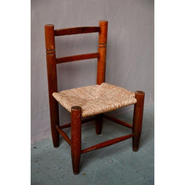 A warm, rustic, and country-style world, this little children's chair transports us. Made of turned solid beechwood in a...