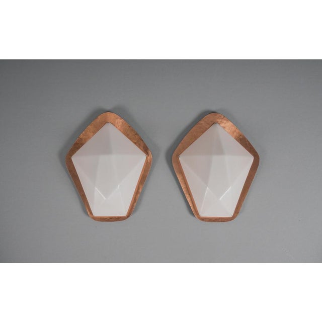 The wall lamps comes with each 1 x E14 / E15 Edison screw fit bulb holder, is wired and in working condition. It runs both...