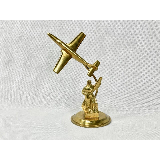 The figurine of PZL TS-11 Iskra airplane comes from the 60's from Poland. At the base the figure of the pilot. All made of...