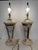 A striking pair of vintage Postmodern table lamps designed with distinct Neoclassical architectural flair. Formed as...