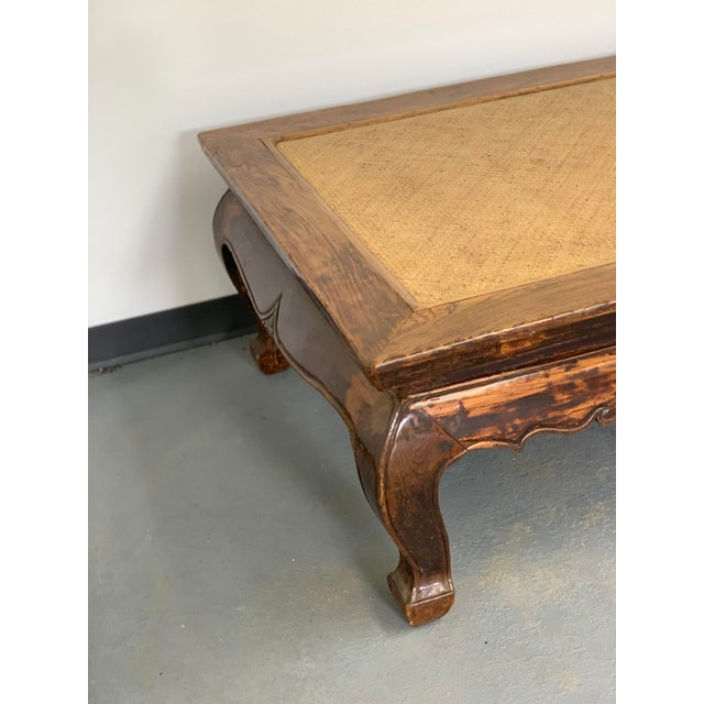 This antique opium bed is a stunning piece of furniture that will add a touch of elegance to any room. Made from elm and...