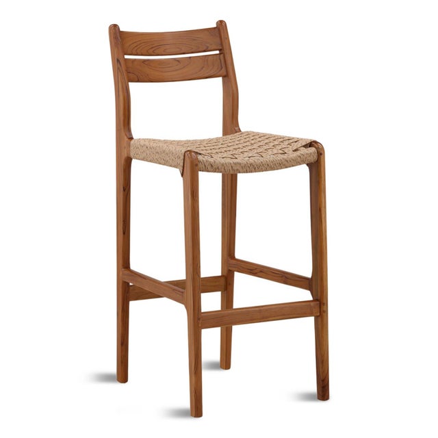 Warm teak frame outdoor bar stool with natural toned faux rope seat. Each chair will vary slightly in exact coloring, wood...