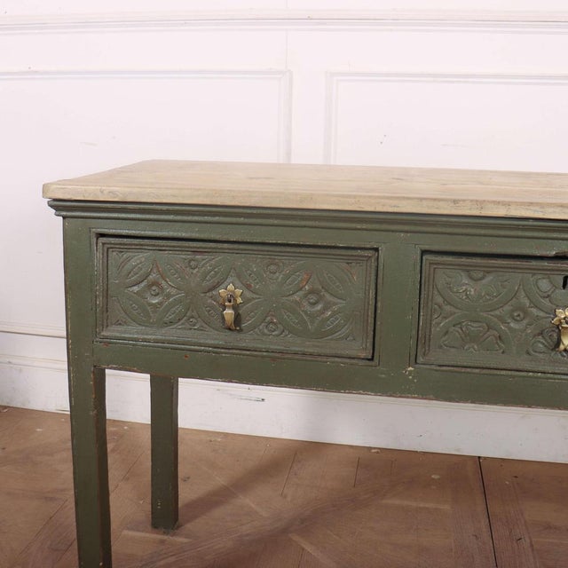 Good 18th C painted and carved 3 drawer dresser base with a good scrubbed sycamore top. 1760 This piece is designed in the...